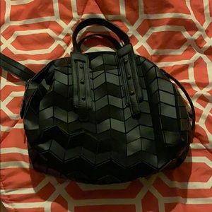 All black geometric pattern purse